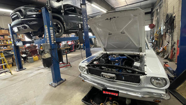 Cars being serviced in Koches garage